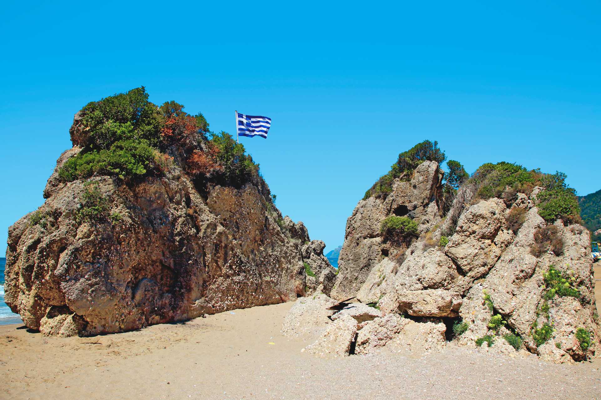 Strandparti i Agios Gordis på Korfu