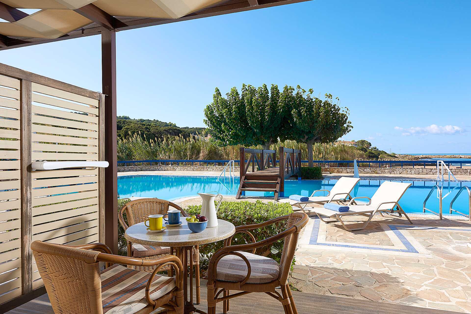 Bungalow med delt basseng på Aldemar Olympian Village i Skafidia, Hellas.