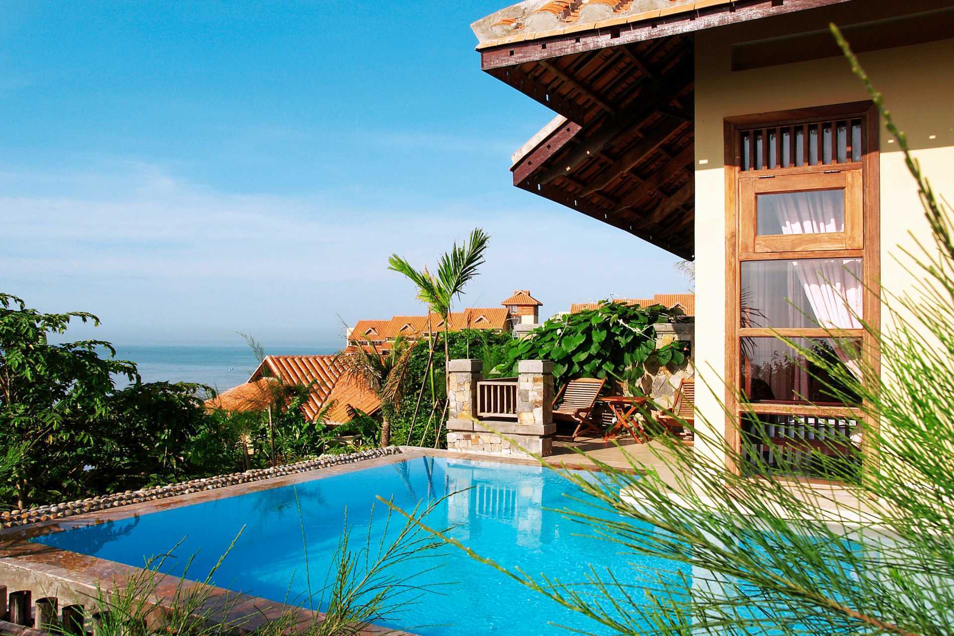 Deluxerom i bungalow på Romana Resort i Phan Thiet, Vietnam.