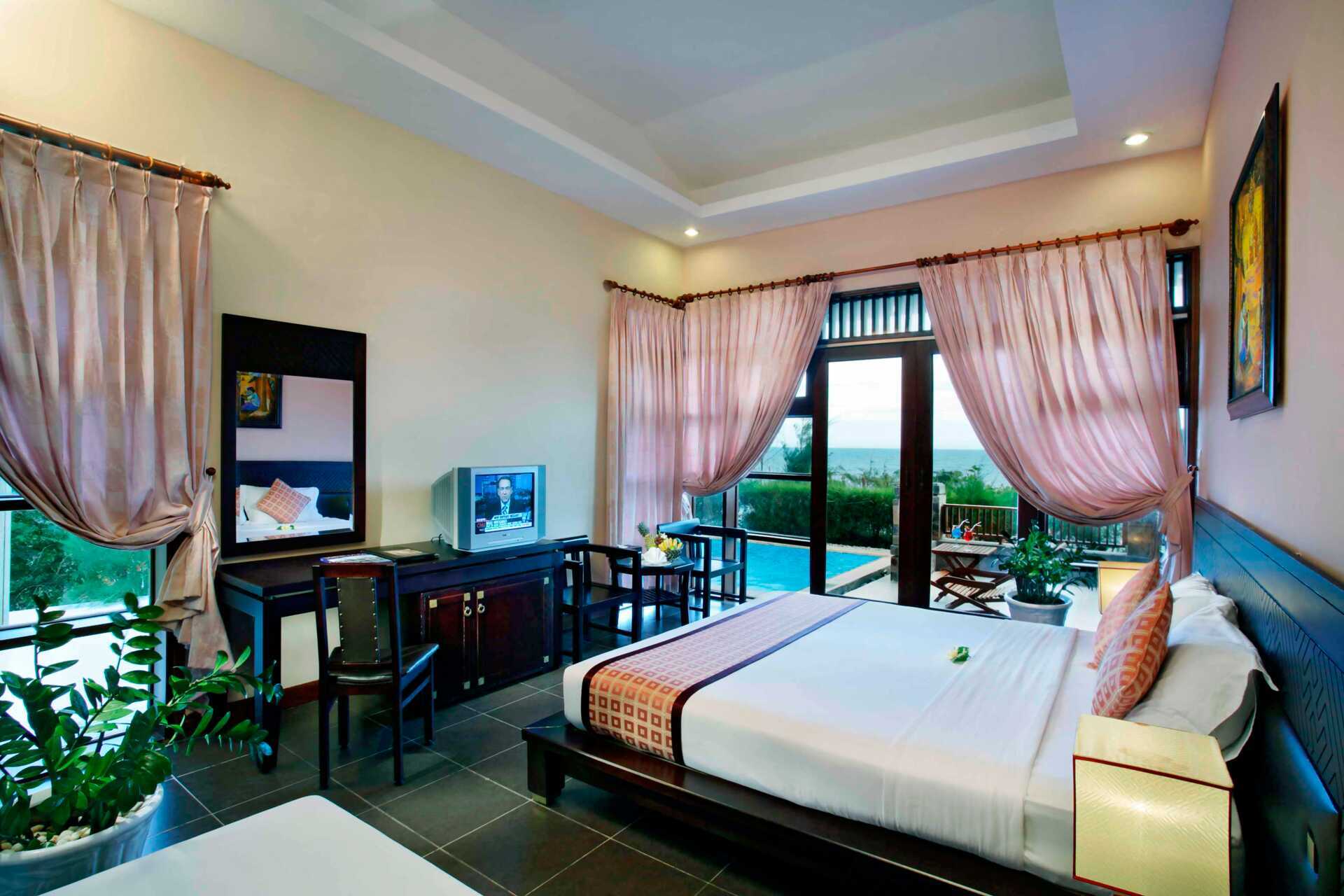 Deluxerom i bungalow på Romana Resort i Phan Thiet, Vietnam.