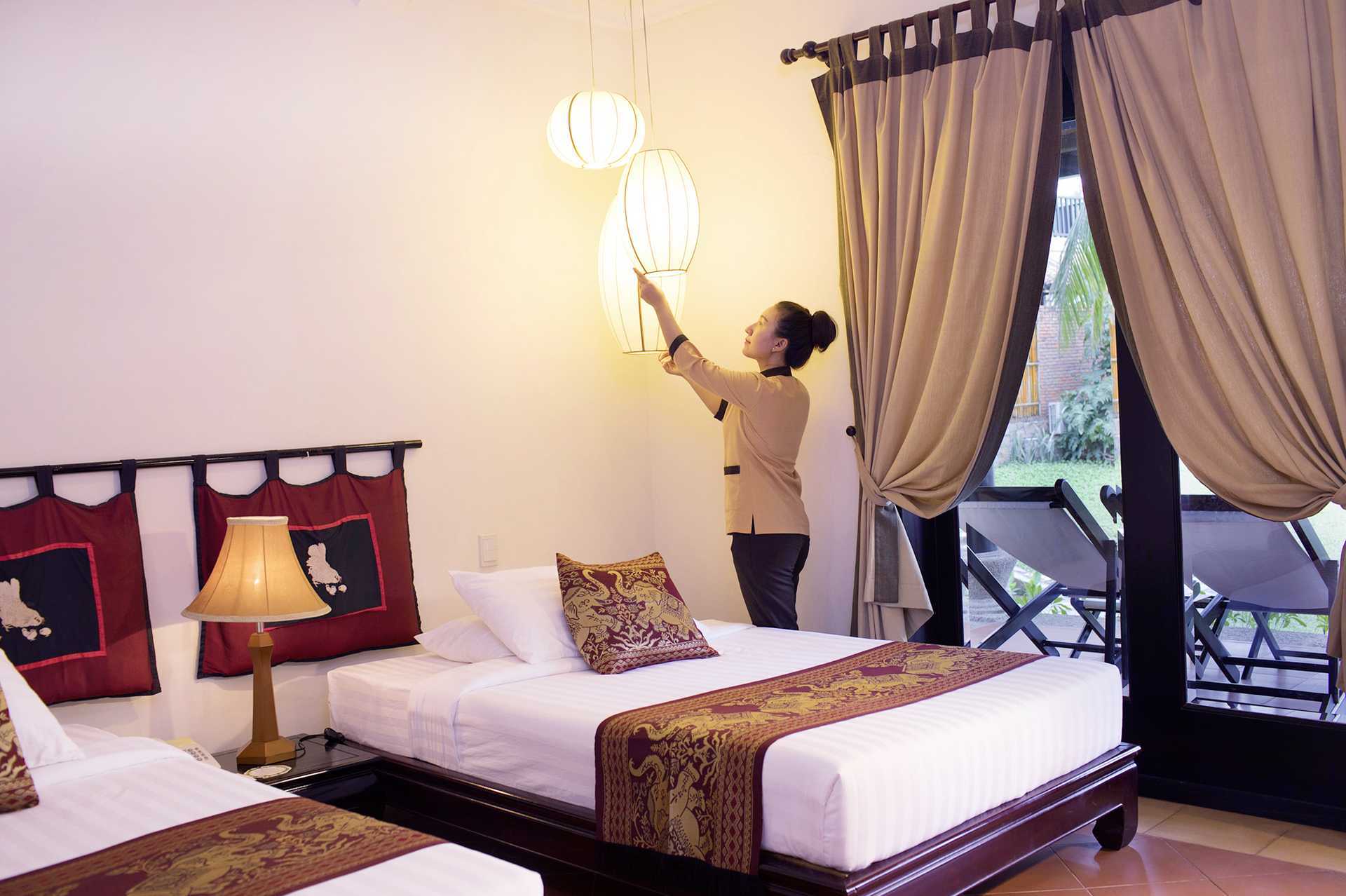 Dobbeltrom i bungalow på Hotel Seahorse Resort &amp; Spa i Phan Thiet, Vietnam.