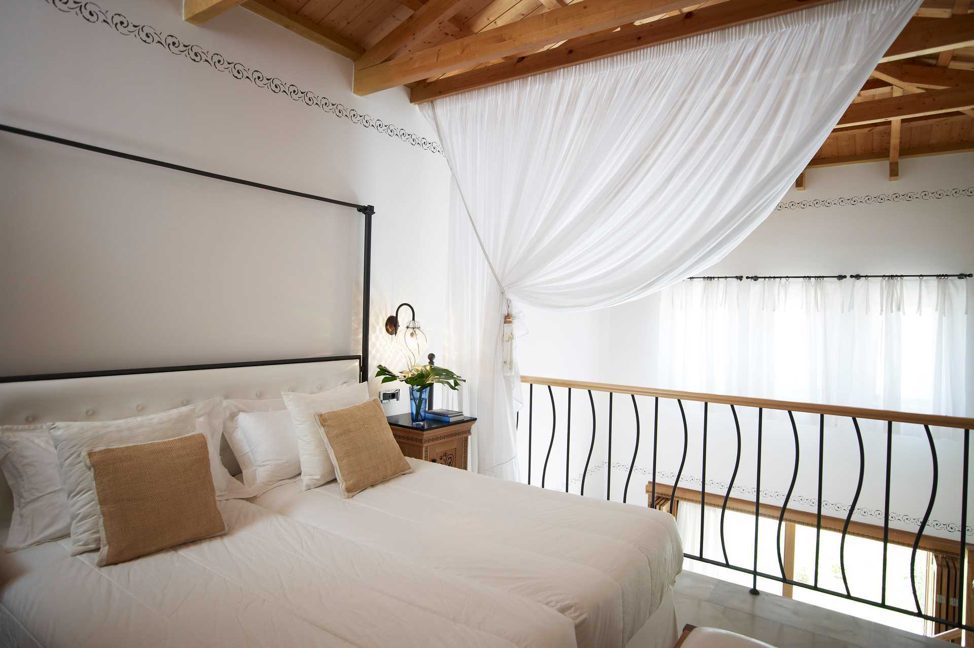 Familierom i etasje på hotell Mitsis Blue Domes Resort &amp; Spa i Kardamena på Kos, Hellas.