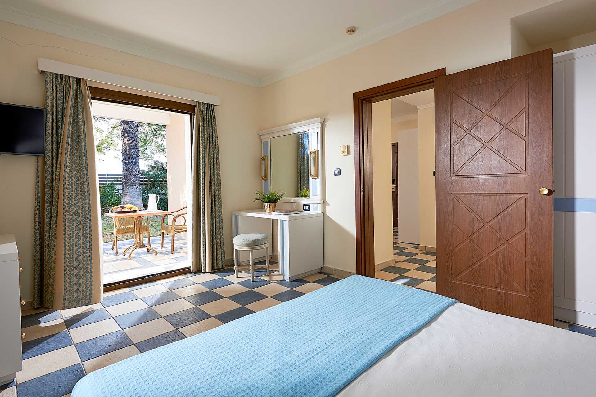 Familierom på Aldemar Olympian Village i Skafidia, Hellas.