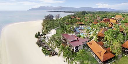 Tradisjonelle bungalows på Meritus Pelangi Beach & Spa Resort på vakre og populære Cenang Beach, Langkawi.